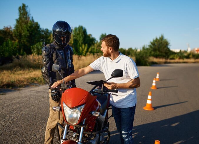 male-student-helmet-instructor-lesson-motorcycle-school-training-motorcyclists-beginners-biker-practicing-motorschool_266732-30865